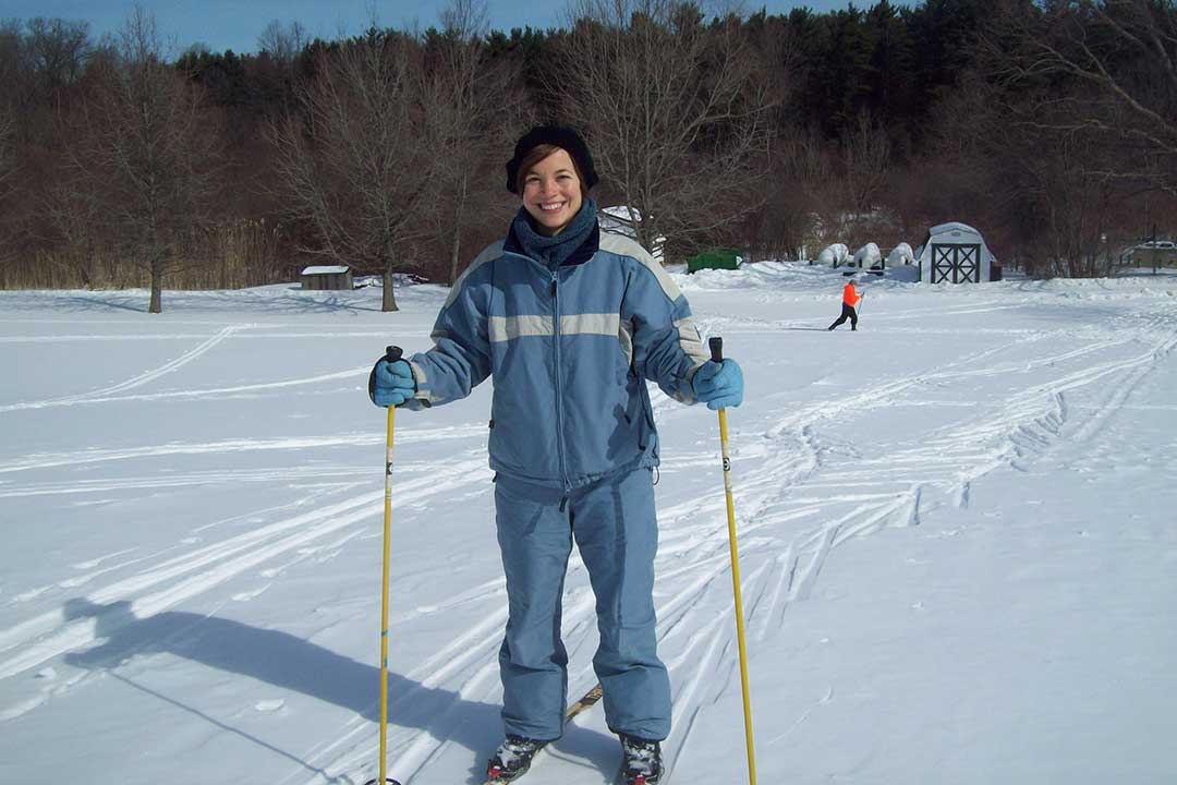 Smiling Woman on Skis