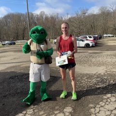 Top finisher with FeLeap the frog mascot
