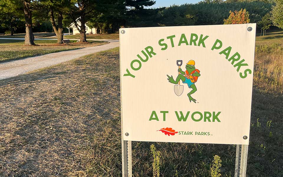 Sign on posts saying Your Stark Parks at Work